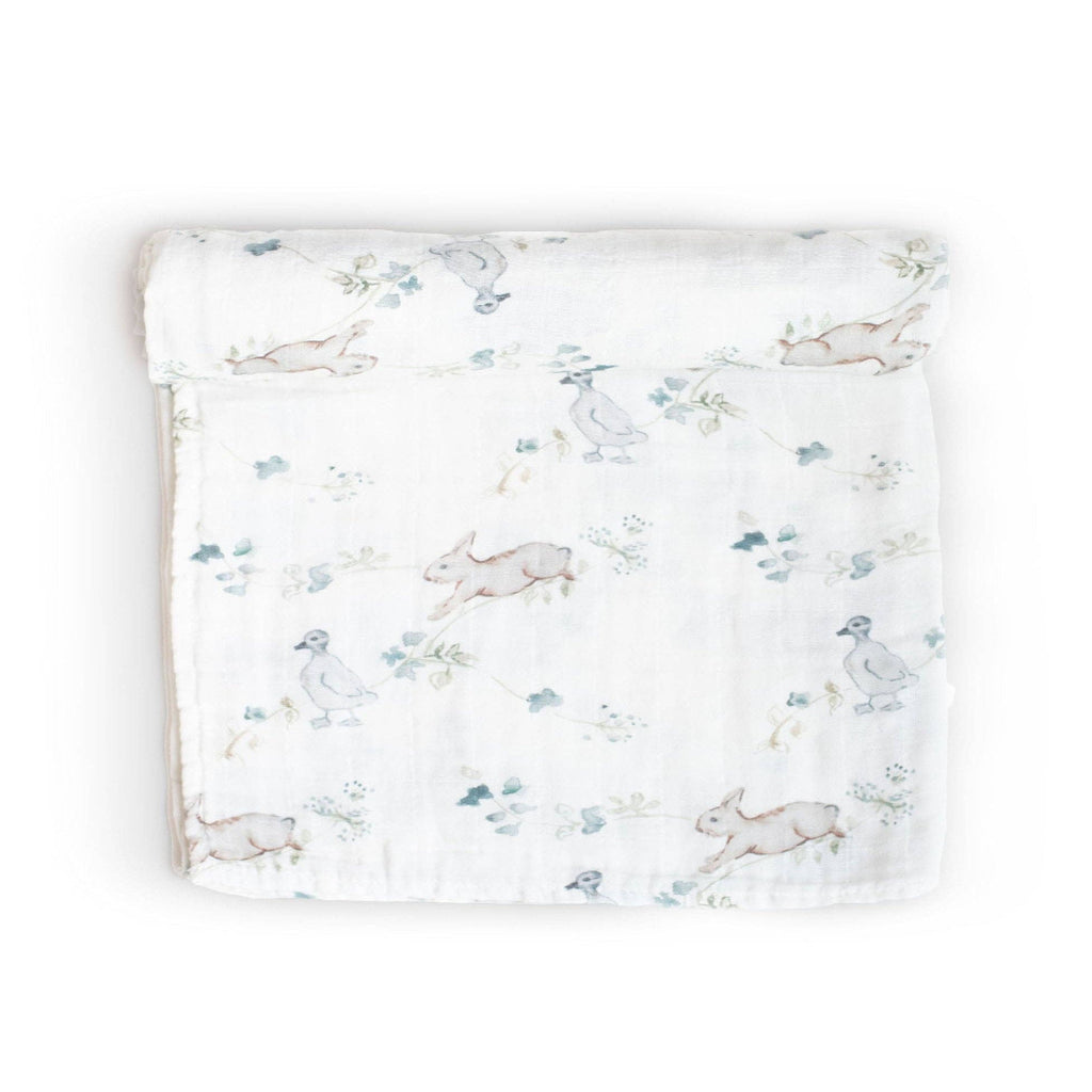 Baby blanket with rabbit pattern on a white background