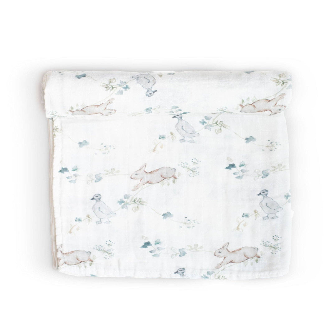 Baby blanket with rabbit pattern on a white background