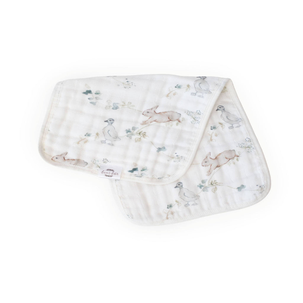Baby burp cloth with animal pattern on a white background